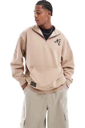 New Era Sudadera con cremallera corta y logo de - neutro