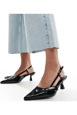 Glamorous Zapatos negros destalonados de tacón bajo con detalle de lazo de