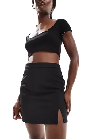 Pieces® Minifalda de sastre negra con muesca delantera de