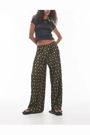 Topshop Pantalones multicolores plisados de pernera ancha con estampado de florecitas de