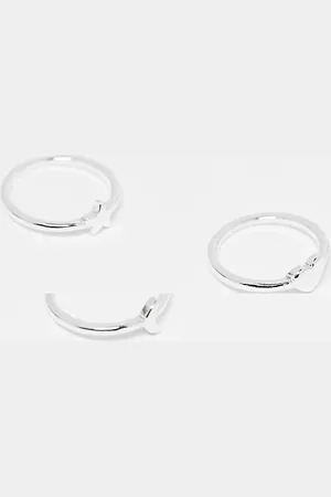 Monki Pack de 3 anillos plateados con diseños de estrella, luna y corazón de