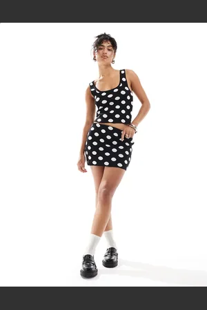 MANGO Falda negra con estampado de lunares de punto de (parte de un conjunto)