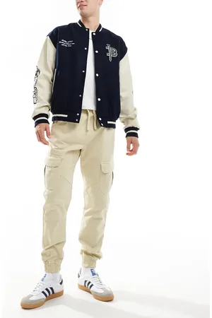 Another Influence Pantalones cargo color piedra claro con bajos ajustados de -Beis