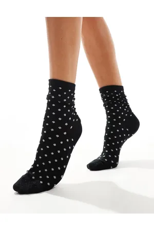 Pieces® Calcetines negros con estampado de lunares con purpurina de