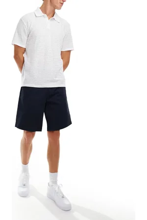 Threadbare Pantalones cortos plisados de corte alargado de