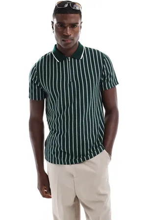 ASOS Polo a rayas con cremallera de