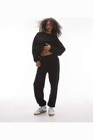 Topshop Joggers negros con bajos elásticos de