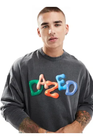 ASOS Camiseta negro lavado extragrande de manga larga con estampado de colores en el pecho de