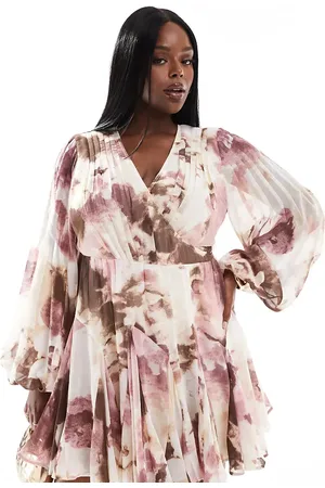 ASOS Vestido corto rosa cruzado con estampado floral, mangas globo y detalle de lazada en la cintura de ASOS DESIGN Curve