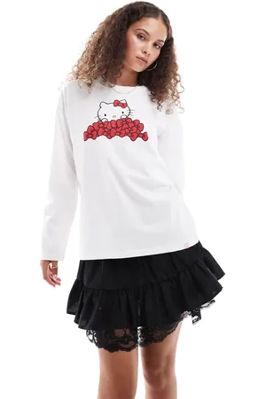Daisy Street Camiseta extragrande de manga larga con estampado gráfico de Hello Kitty y lazos de