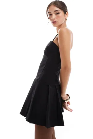 MANGO Vestido corto de tirantes con falda plisada de