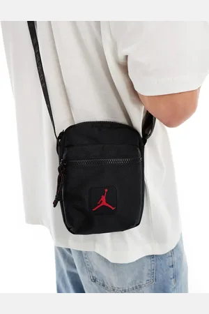 Jordan Bandolera negra con logo de