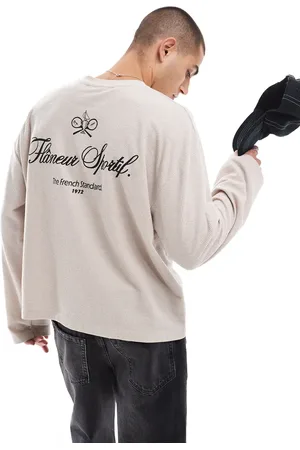 ASOS Camiseta beis de corte cuadrado extragrande y manga larga con estampado deportivo de texto en la espalda y textura gofrada de -Beis neutro