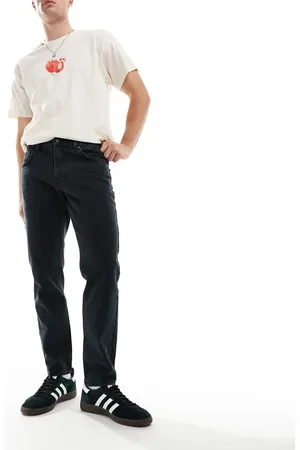 ASOS Vaqueros de corte tapered con lavado oscuro y tintado verde de