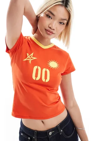 COLLUSION Camiseta de estilo deportivo con diseño encogido y ribetes de