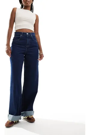 ASOS Vaqueros de corte suelto con lavado azul tinta y dobladillos anchos de