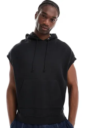 COLLUSION Sudadera negra sin mangas con capucha con ribete de piel y detalle estampado de