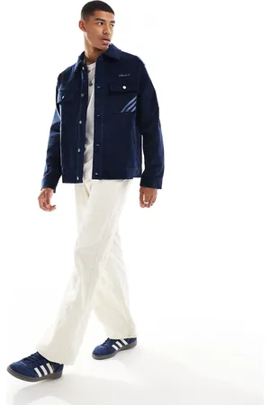 adidas Chaqueta azul de estilo entrenador de