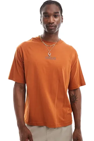 Timberland Camiseta extragrande con logo repetido exclusiva en ASOS de