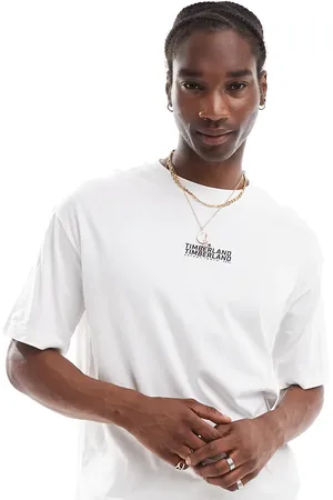 Timberland Camiseta blanca extragrande con logo repetido exclusiva en ASOS de