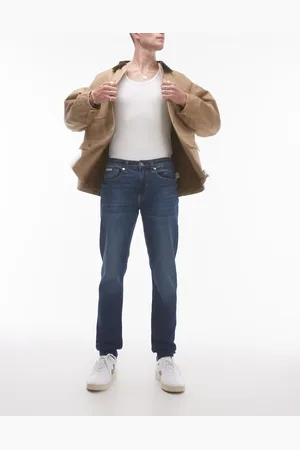 Calvin Klein Vaqueros de corte slim tapered con lavado medio de Calvin Klein-Azul