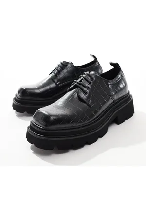 ASOS Zapatos negros con suela gruesa, cordones y acabado desgastado de