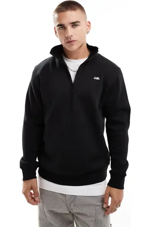 JJ Sudadera negra con media cremallera y logo pequeño en el pecho de