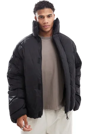 JACK & JONES Chaqueta acolchada negra con diseño de paneles verticales de Premium
