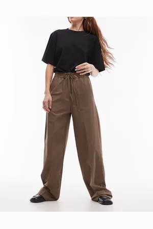 MANGO Pantalones marrones holgados con cinturilla elástica con lazada de