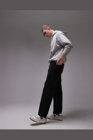 ARKET Pantalones negros de pernera holgada con detalle de cinco bolsillos de