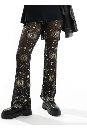 Noisy May Pantalones negros de pernera ancha con estampado cósmico dorado metalizado de malla de