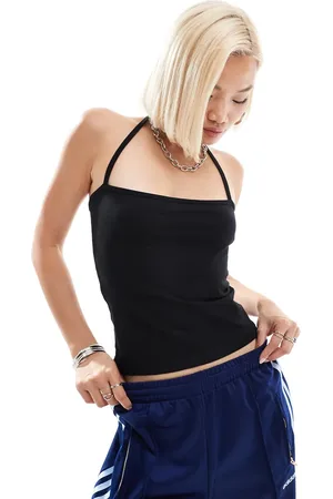 COLLUSION Top con cuello halter de tirantes de