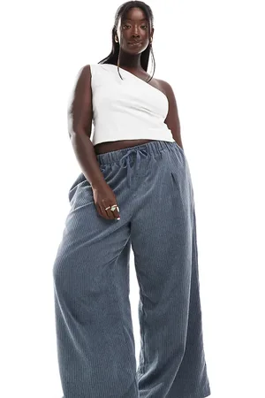 ASOS Pantalones azules de pernera ancha sin cierres de pana de Curve