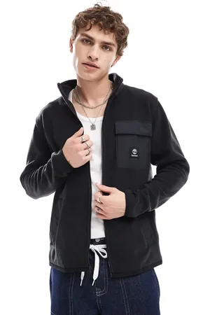 Timberland Chaqueta negra con cremallera y bolsillo en contraste de felpa de
