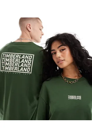 Timberland Camiseta oscuro extragrande con logo repetido exclusiva en ASOS de