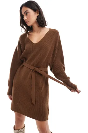 EDITED the label Vestido corto tabaco con lazada en la cintura de punto de