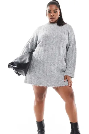 Pieces® Vestido corto jaspeado con mangas anchas de punto de PIECES Curve