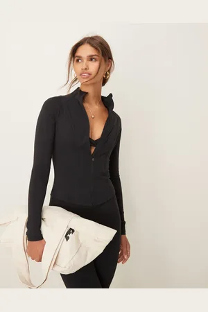 Tala Chaqueta negra con cremallera DayFlex de