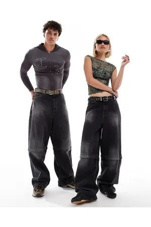 COLLUSION Vaqueros negro lavado con diseño 2 en 1 desmontable de Unisex