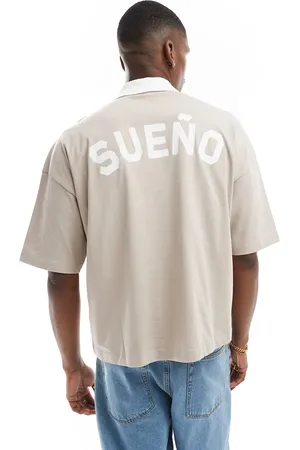 ASOS Camiseta color de corte cuadrado extragrande con cuello tipo polo y estampado gráfico en la espalda de -Beis neutro