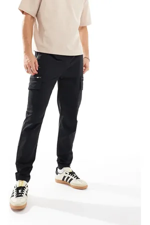 River Island Pantalones cargo negros de corte pitillo de