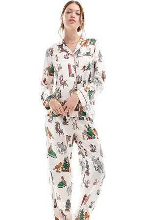Chelsea Peers Pijama color de top de manga larga y pantalones con estampado de circo de Navidad de satén de -Blanco