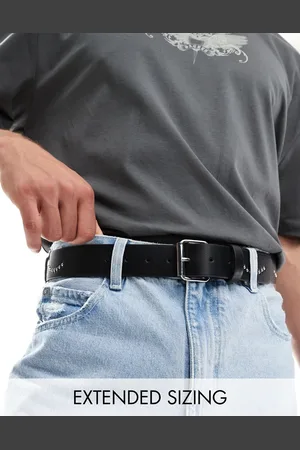 ASOS Cinturón de cuero sintético con diseño de telaraña de tachuelas de
