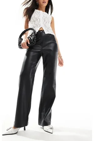 River Island Pantalones negros de corte recto holgado de cuero sintético de
