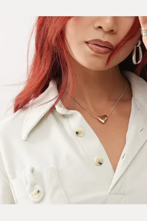 Reclaimed Collar con colgante de corazón y acabado de metales combinados de