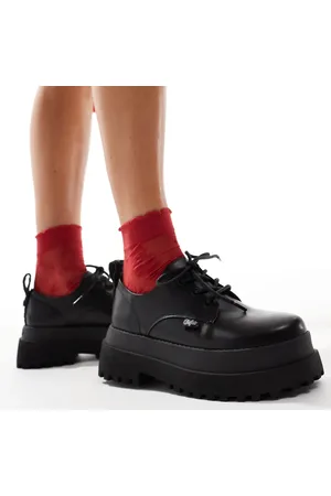 Buffalo Zapatos negros con suela gruesa y cordones de