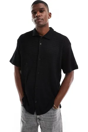 JACK & JONES Camisa negra extragrande de manga corta de tejido texturizado de