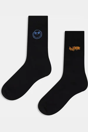 ASOS Pack de 2 pares de calcetines negros con diseño de "Pesadilla antes de Navidad" de Disney de