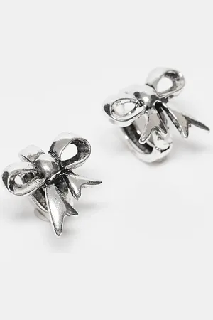 Reclaimed Pendientes de aro pequeños de tono pulido con diseño de lazos de