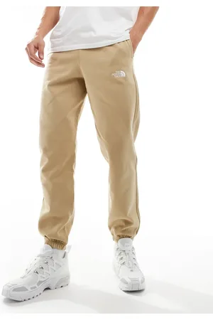 The North Face Joggers beis básicos extragrandes con logo Essential de